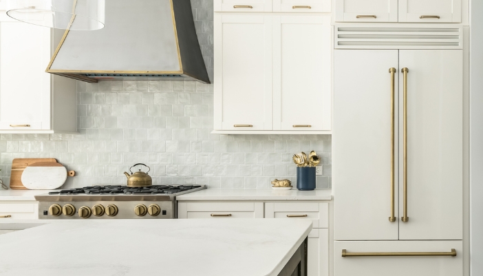 Luxury kitchen with white and gold appliances