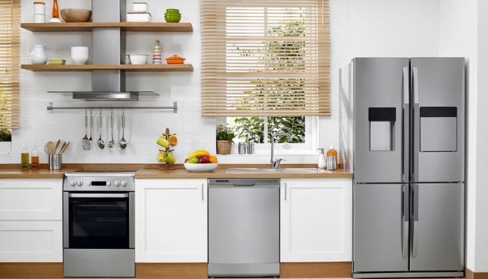 Stainless steel appliances are featured in a kitchen