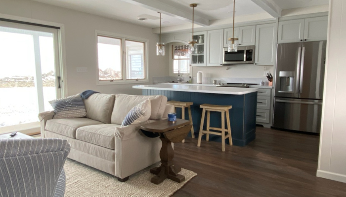 updated kitchen of lakeside home with new appliances, cupboards, and fixtures