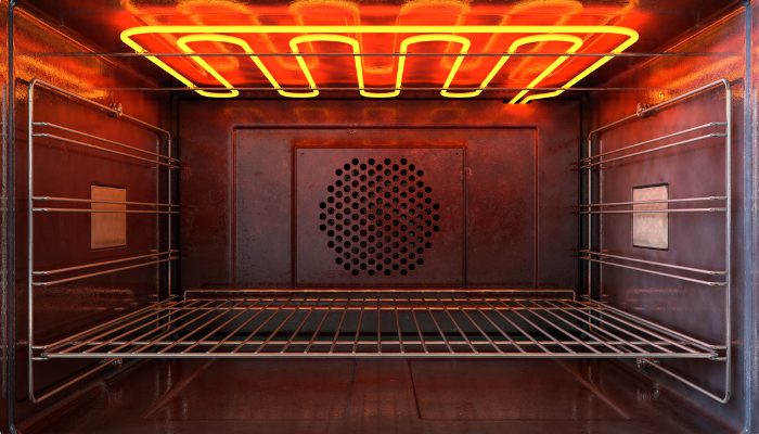 close up of the heating element turned on in an electric oven