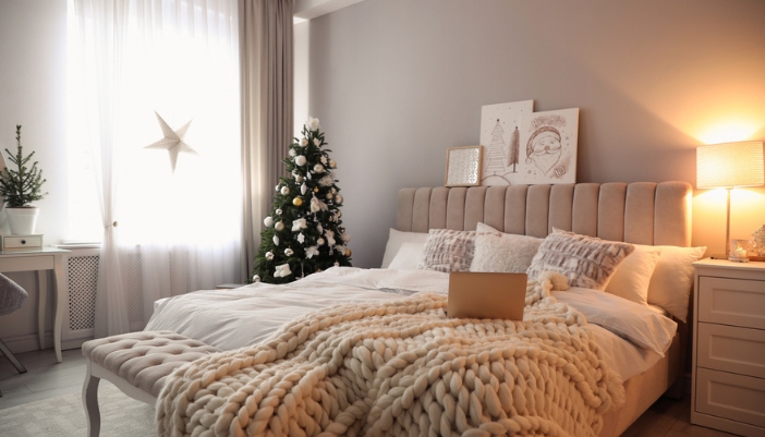 A guest room decorated for the holidays and ready for guests.