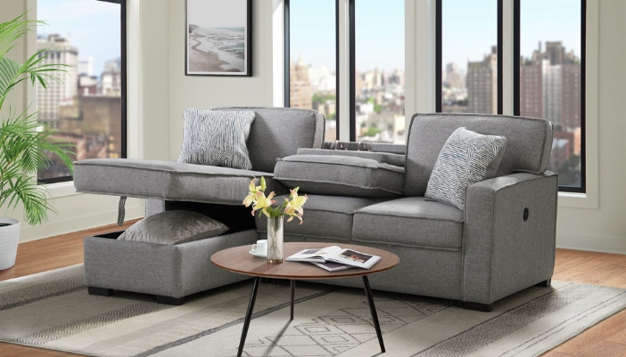 A modern living room with a sofa that has storage built in.