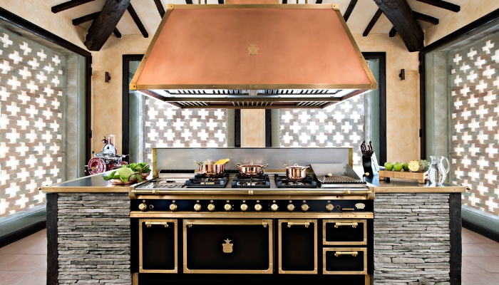 Officine Gullo black kitchen with copper details