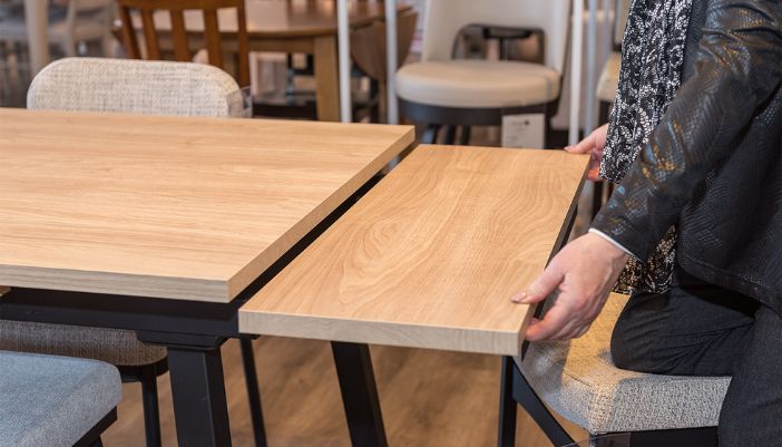 extendable table in furniture showroom