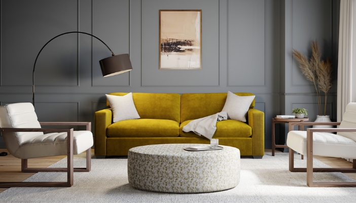 A modern living room with a yellow couch as the focal point.