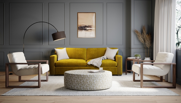 A bold yellow couch rests in front of a gray couch.