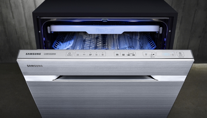 A close-up of a Samsung dishwasher partially open.