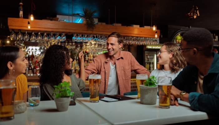 Friends engaging and connecting at a restaurant