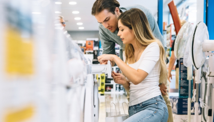 Couple shopping for appliances