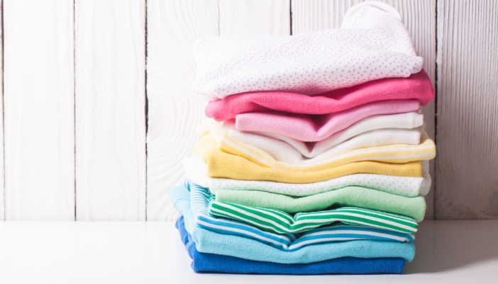 A stack of neatly folded clothes in good condition