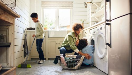 Family Washing Clothes Together