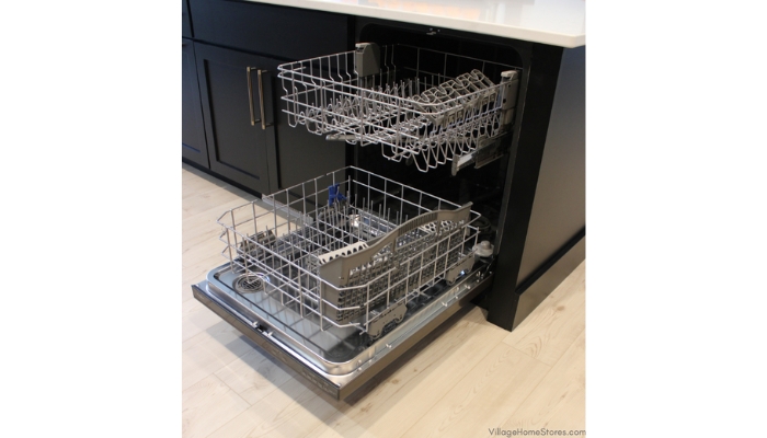 black cabinet kitchen island with dishwasher shown with door open