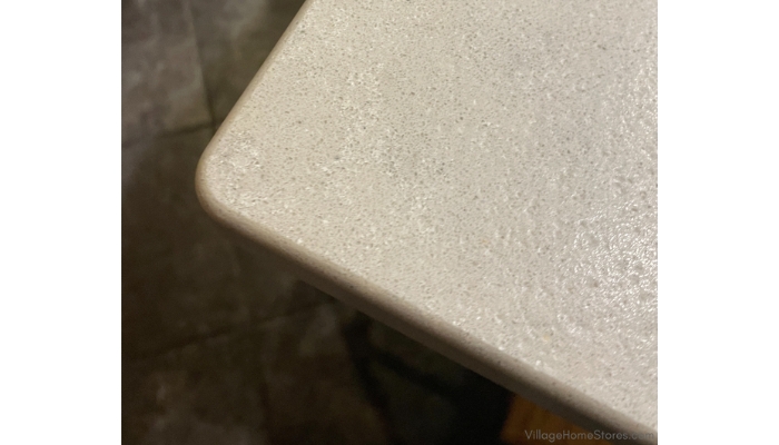 Corner of installed kitchen countertop in Hanstone Quartz Coast with Riverwashed finish
