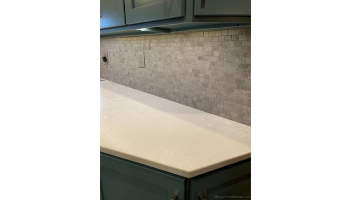 Orion Illinois kitchen with painted cabinets, replaced countertops, new undercabinet lighting, and mosaic wall tile backsplash