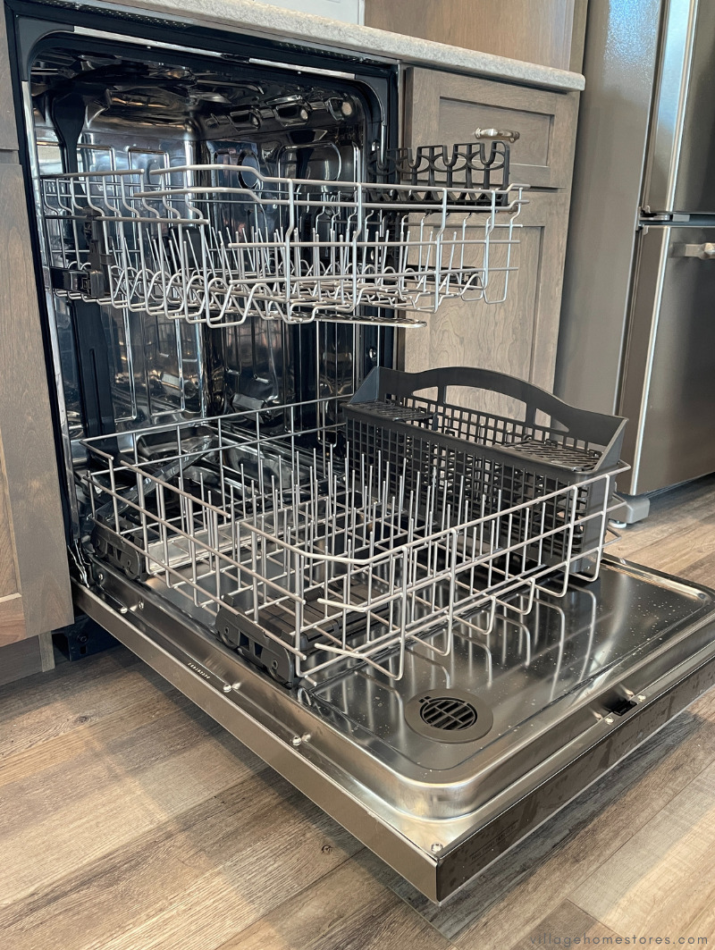 maytag 4949 dishwasher with door open showing racks and stainless tub