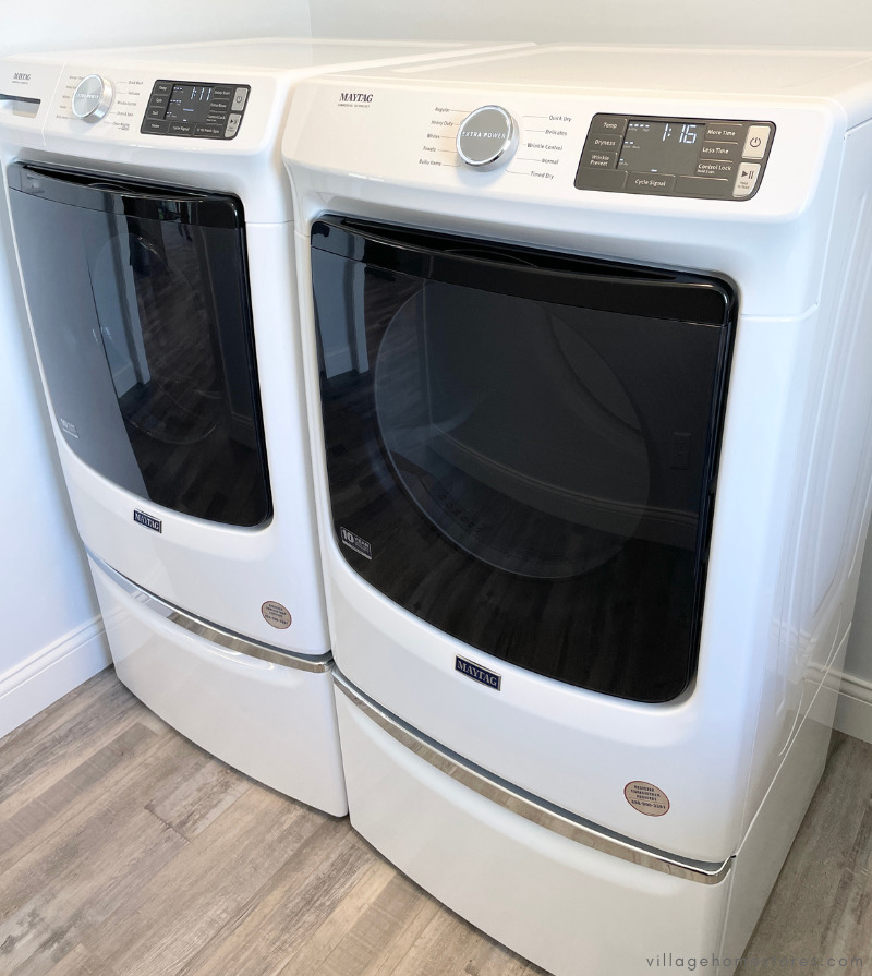 white front load maytag laundry units shown on pedestals