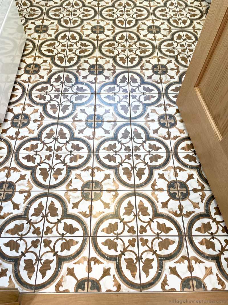 patterned tile flooring with black and woodgrain design
