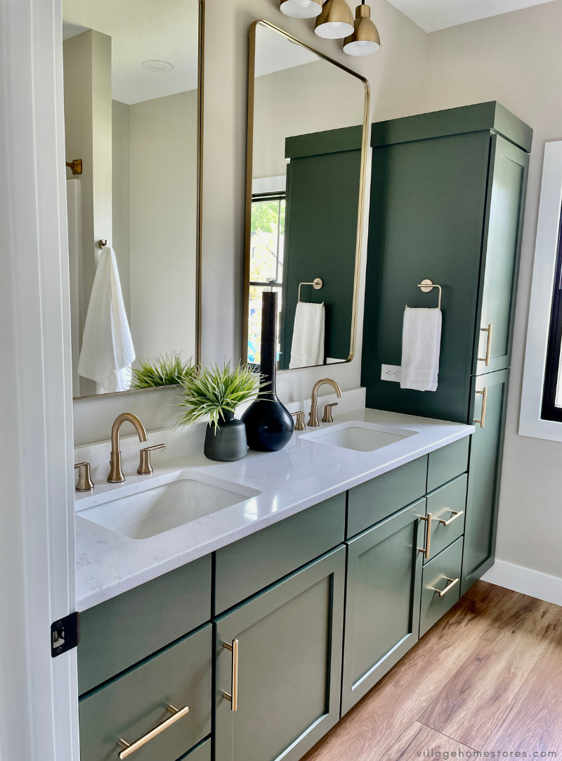quad cities area bathroom with cabinet design in dark green paint from village home stores