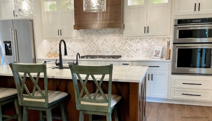 White kitchen with cherry island