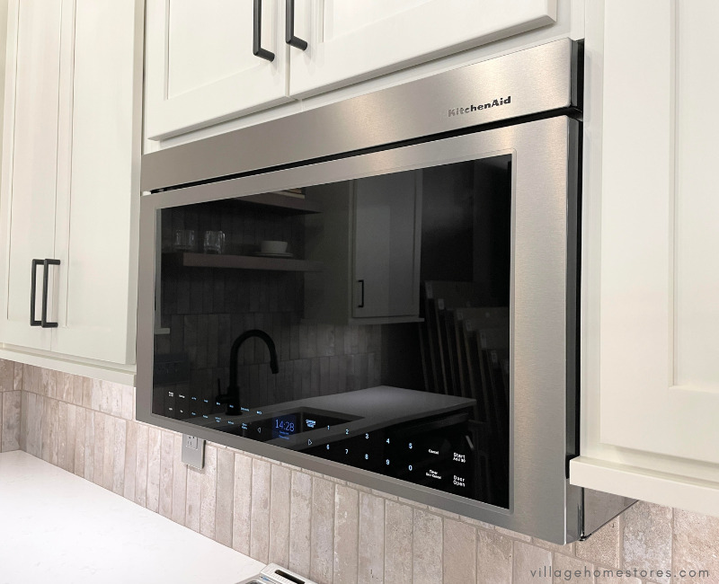 KMMF730P multifunction kitchenaid microwave hood installed in white wall cabinetry kitchen