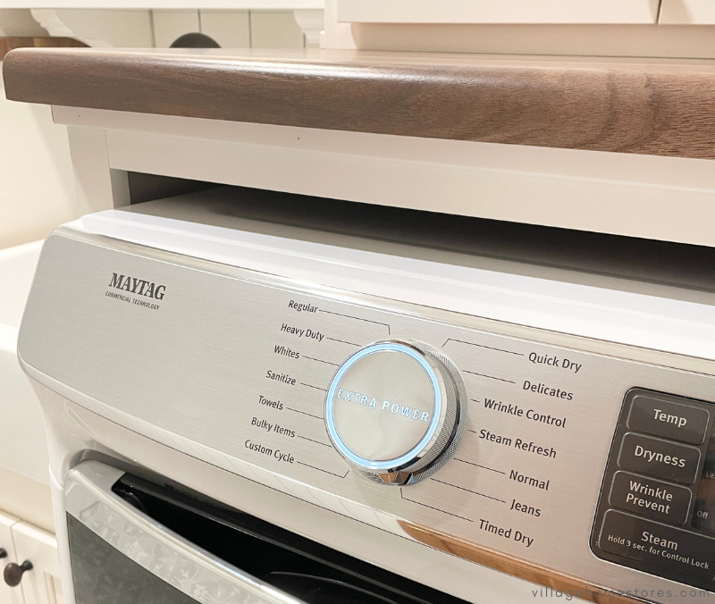 closeup of maytag laundry controls with extra power button lit up