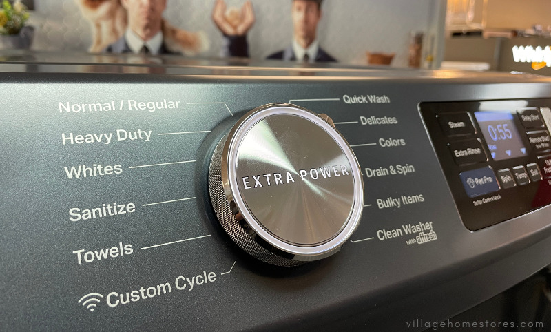 maytag pet pro front load washer controls with extra power button lit up
