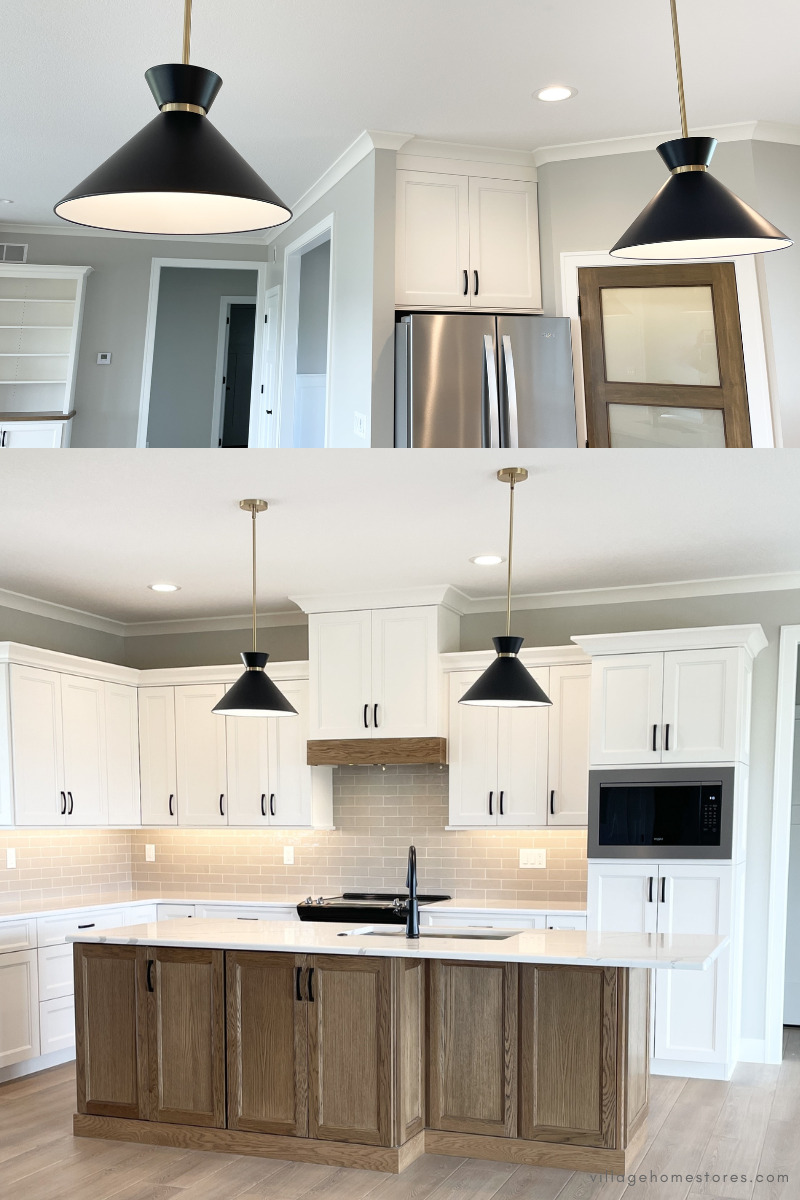 kitchen pendant lights installed about kitchen island in black and brass finishes