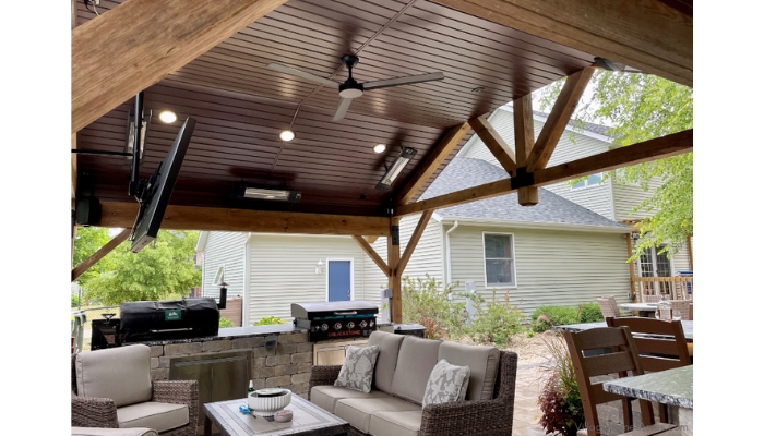 covered patio area with outdoor patio ceiling fan and ceiling mounted space heaters