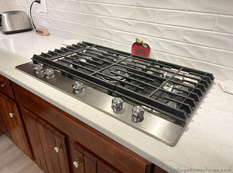 36 inch gas cooktop with full-width grates and 5 burners