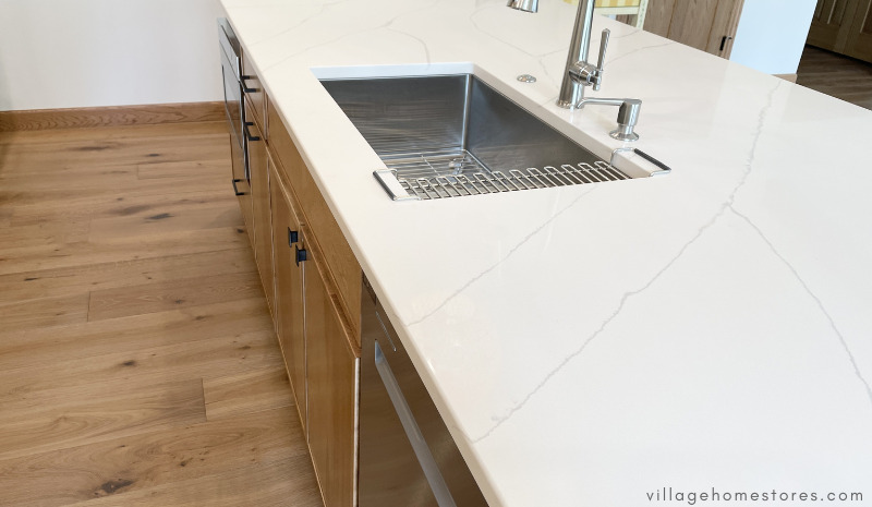 kitchen island with undermount sink with Calacatta Ultra MSI quartz countertop