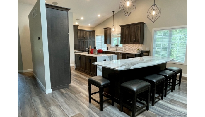 open concept kitchen layout with two large kitchen islands
