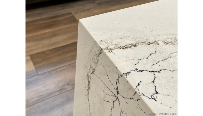 cambria quartz skara brae counters installed with a mitered waterfall corner on kitchen island
