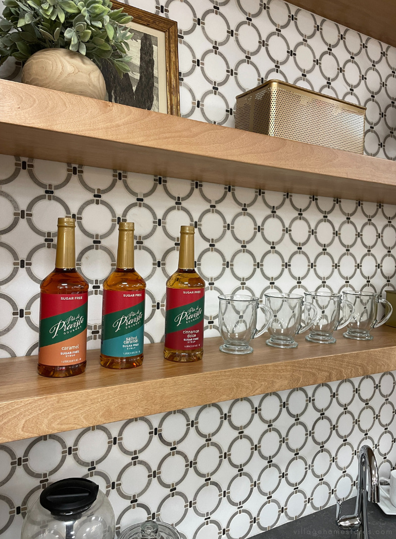 side by side images of the same cabinet display shown on left as a coffee bar and on right staged for cocktails
