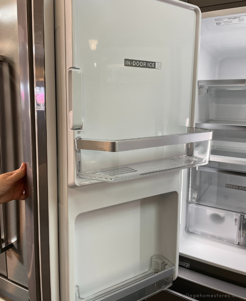 in door ice access on interior door of whirlpool quad door refrigerator with water and ice dispense
