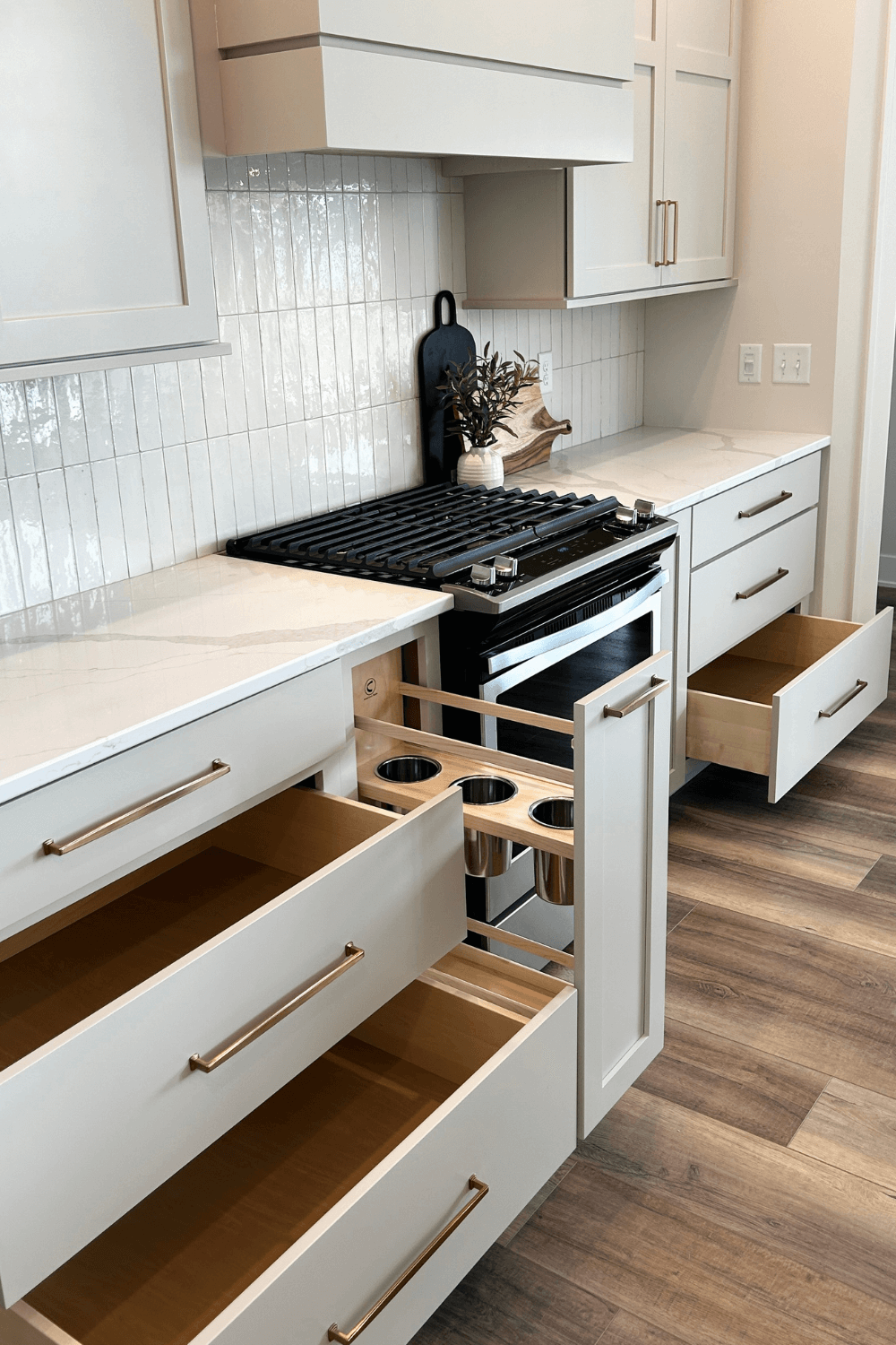kitchen storage cabinets including large pots and pans drawers and pullout utensil cabinet