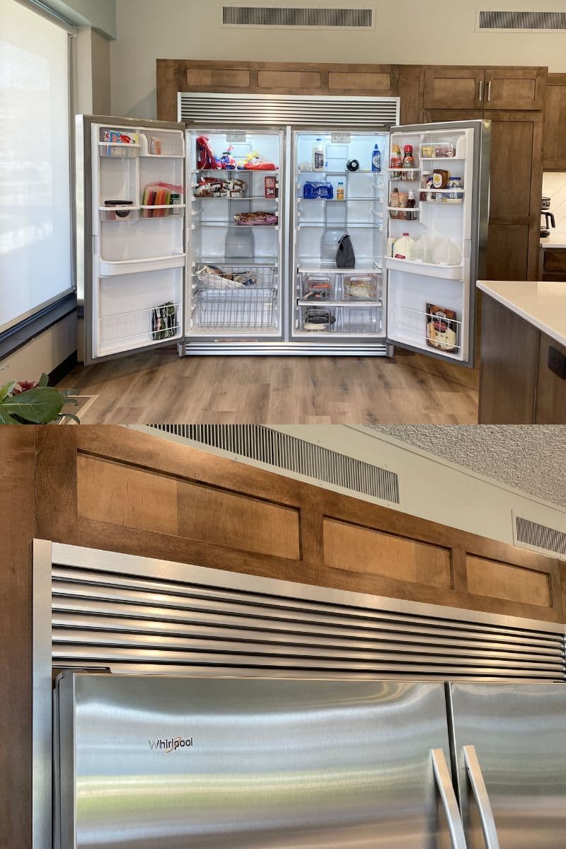 stainless steel whirlpool sidekicks all freezer and all fridge unit with trim kit installed in a maple cabinet kitchen