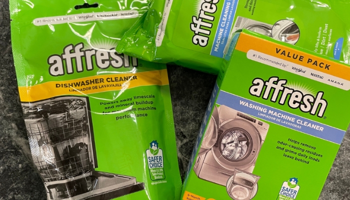 packages of afresh appliance cleaner with bright green packaging