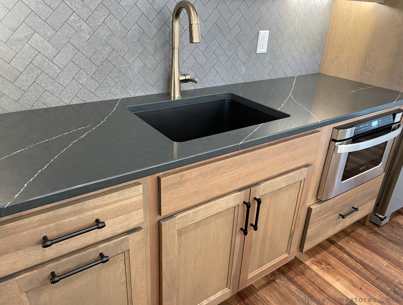 matte black bar countertops with white marble look veining