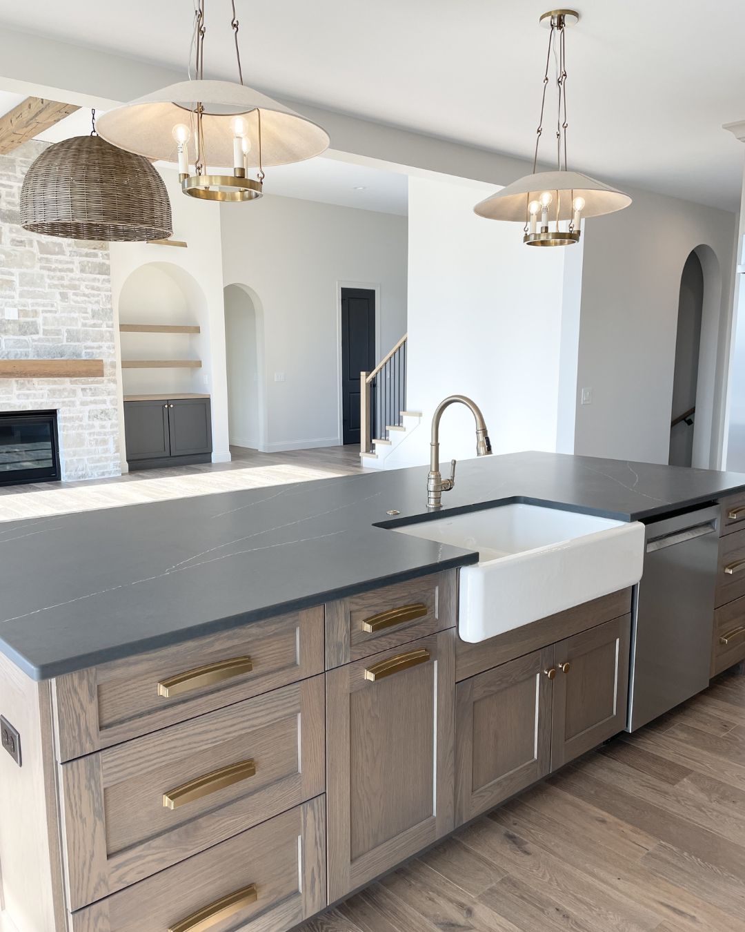 white oak kitchen island with pendant lighting above