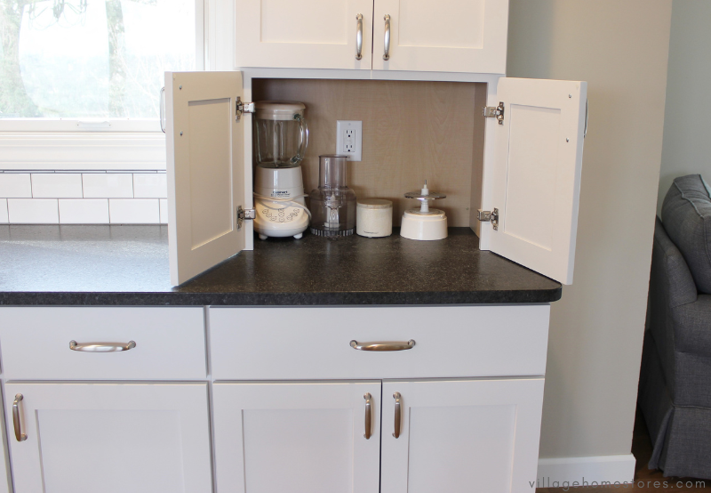countertop appliance garage area with doors