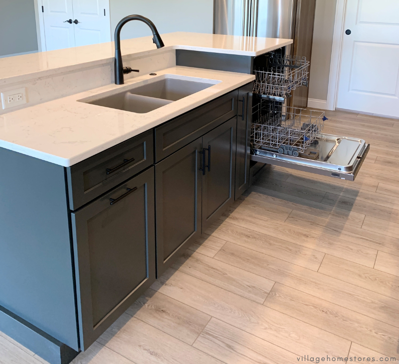 kitchen island with undermounted kitchen sink and raised dishwasher installation