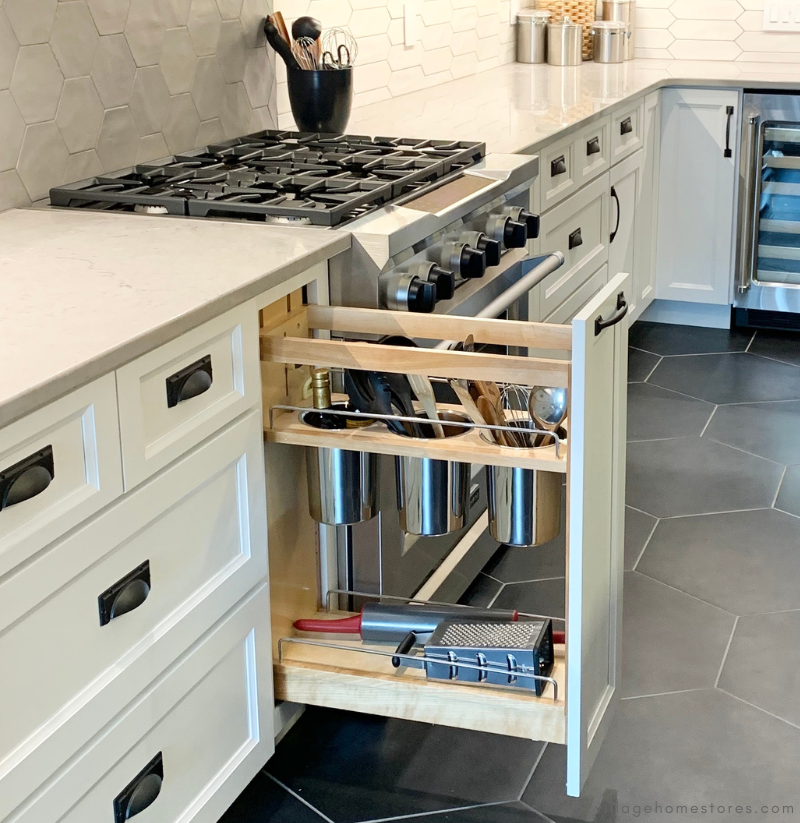 base cabinet with pullout utensil storage bins and shelf