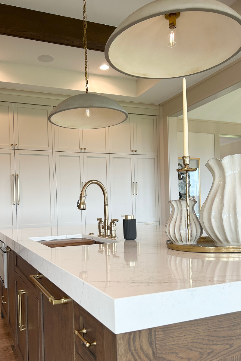 kitchen with lighting and countertops from village home stores for windmiller design 