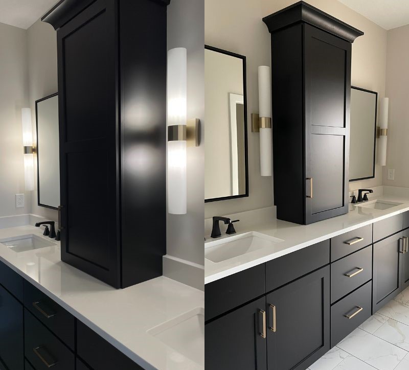 black painted vanity cabinets in primary bathroom