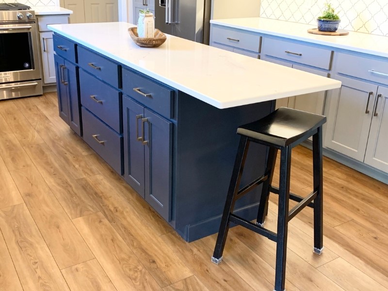 blue cabinet kitchen island with overhang for single seat