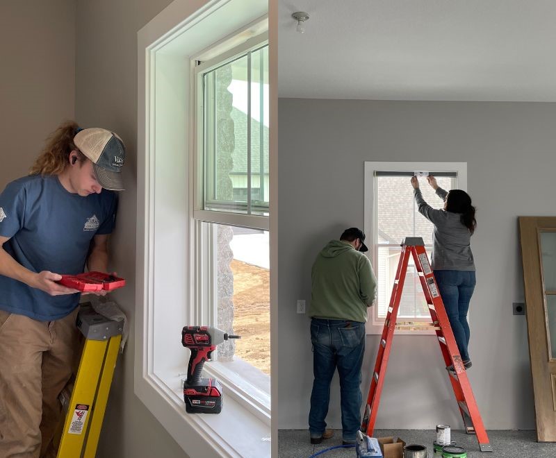 village home stores staff installing window treatments