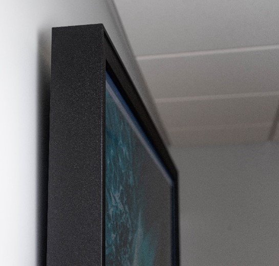 A Sony Studio Frame mounted on the wall. 