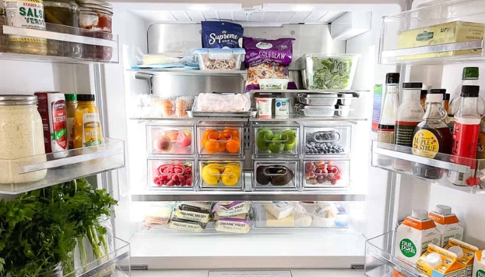 interior of fridge stocked with food