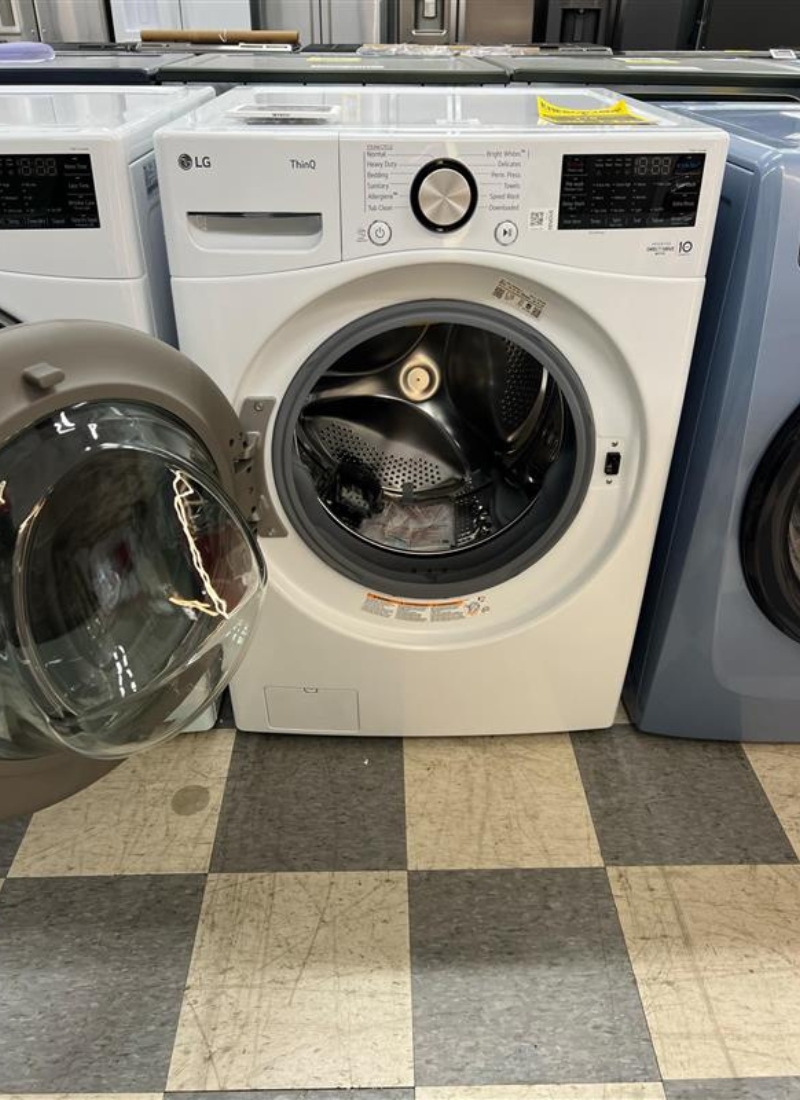 A close-up of a front-load washing machine.