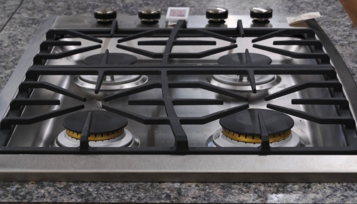 A closeup of a gas range